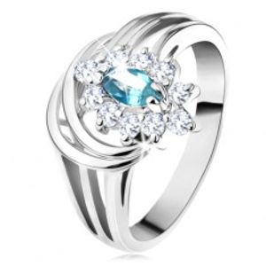 Lesklý prsten s rozvětvenými rameny, světle modré zirkonové zrnko, obloučky G10.25