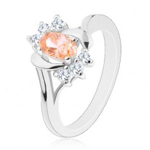Prsten ve stříbrné barvě, světle oranžový broušený ovál, oblouky, čiré zirkonky G06.21