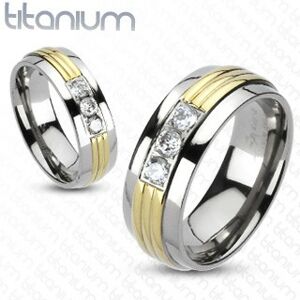 Prsten z titanu - pozlacený střed, tři čiré zirkony - Velikost: 70