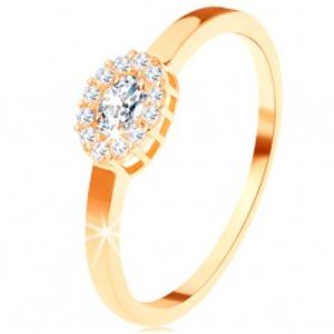 Zlatý prsten 585 - oválný čirý zirkon lemovaný kulatými zirkonky GG112.47/113.01/06